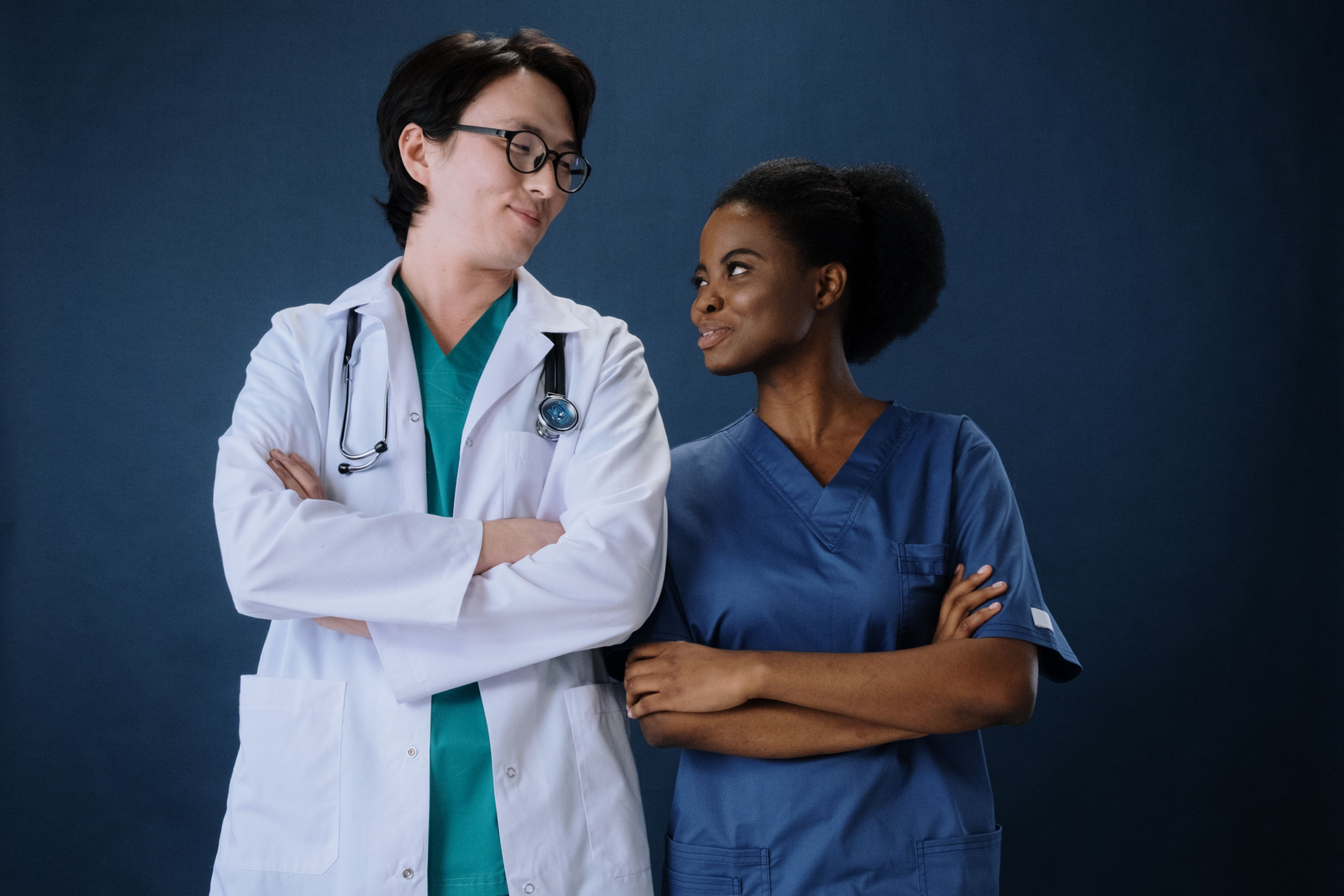 Licensed healthcare providers reviewing patient care