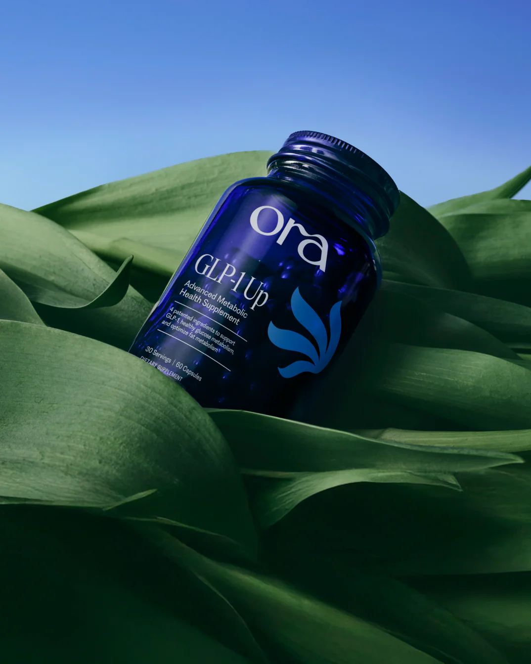 GLP-1 supplement bottle among green leaves